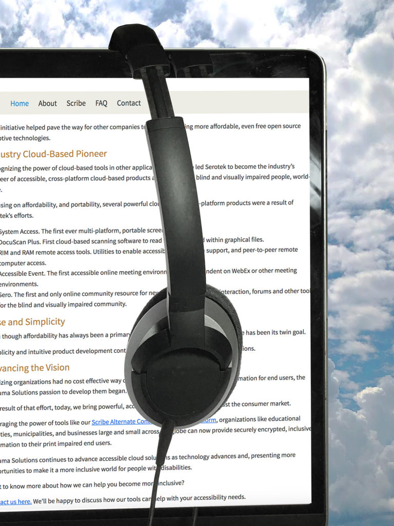 Headphones on a computer monitor showing text. Clouds in background.