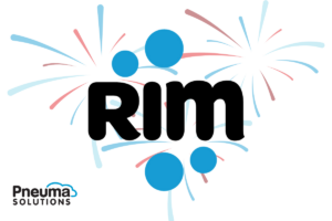The RIM logo has the letters RIM surrounded by four blue circles representing remote target machines. Red and blue fireworks can be seen in the background, along with the Pneuma Solutions logo in the bottom left.